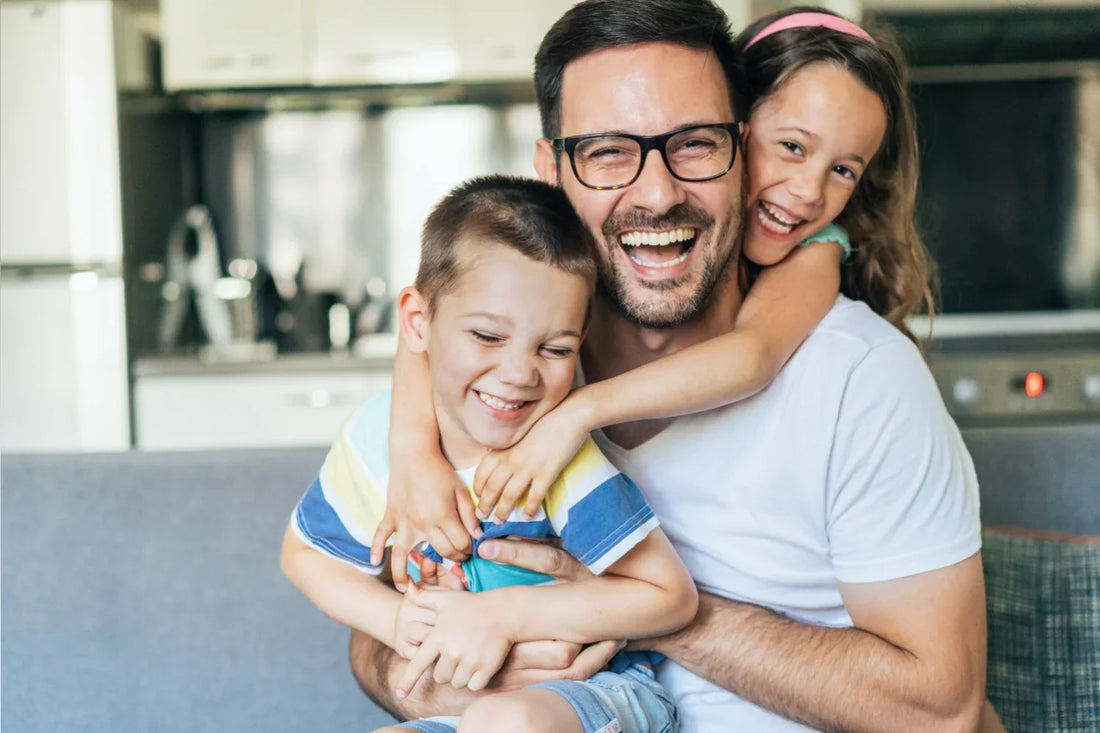father-smiling-with-kids