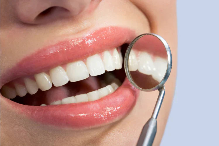 An image of a person showing straight teeth