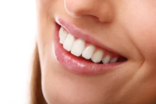 A smiling woman with a class I bite.