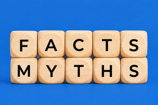 Wooden blocks spelling facts and myths on a blue background