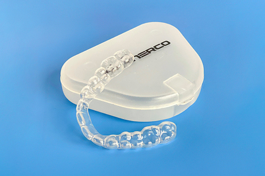 ALIGNERCO Clear Aligner placed with its storage container