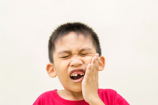 A boy with a toothache