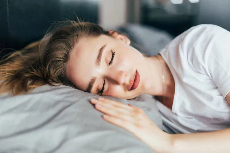 A girl sleeping while wearing a night guard