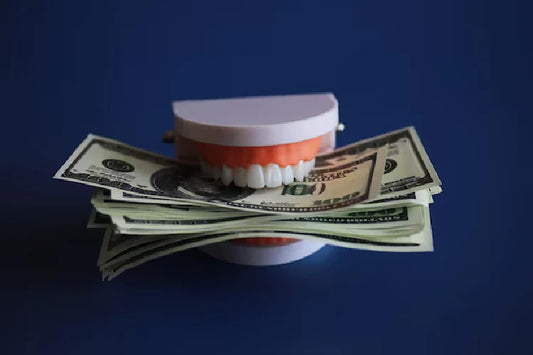 A model of perfect teeth holding money