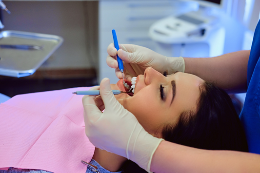 A person undergoing teeth reshaping