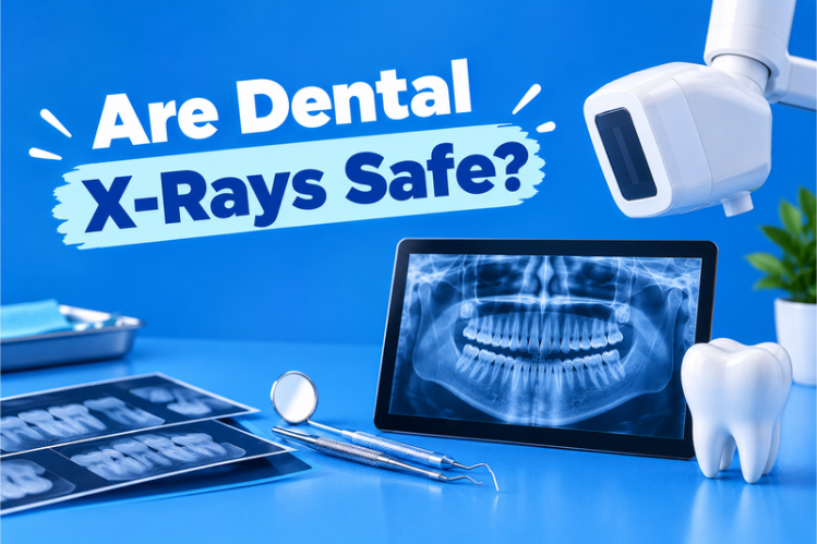 Dental X-ray on a tablet beside a tooth model and dental tools
