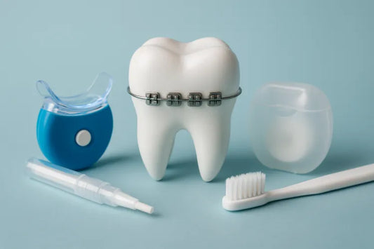 A tooth with braces and other braces cleaning tools on the side 