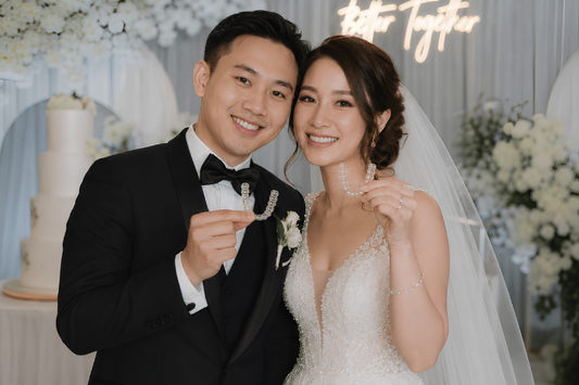 A couple holding aligners on their wedding day.