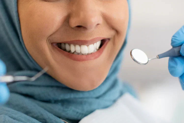 Closeup of a woman smiling during a dental checkup