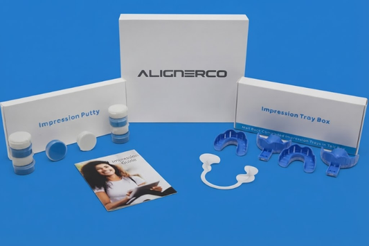 ALIGNERCO dental impression kit with putty and trays on blue background