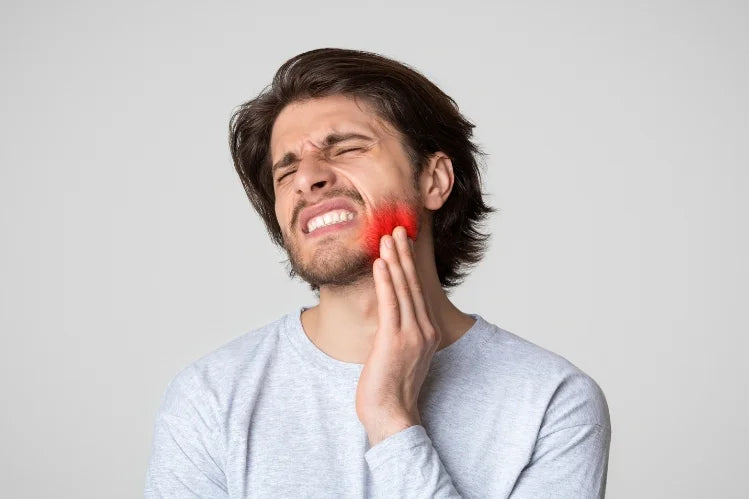 a man having pain in his jaw
