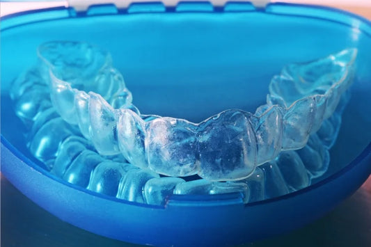 Retainers stored in a blue retainer case