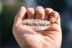 Does a Retainer Work for TMJ?