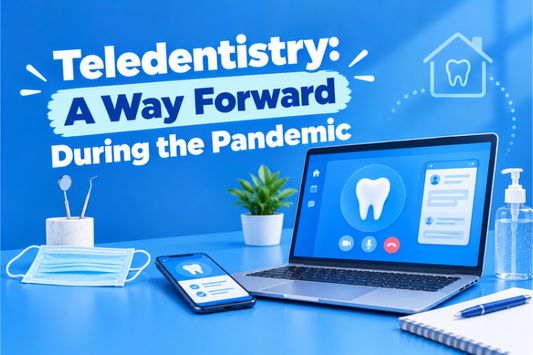 Laptop showing a virtual dental consultation beside a phone and face mask