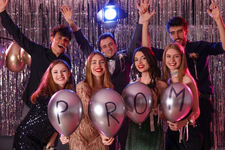 A group of friends enjoying prom night.