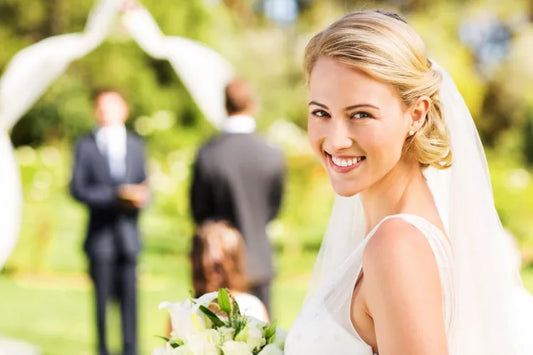  A bride confidently smiling on her big day.