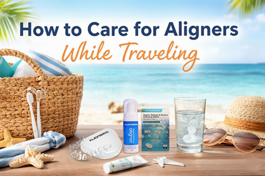 Image showing ALIGNERCO aligner care kit, cleansing tablets, protective case, and a toothbrush on a beach background for travel use.