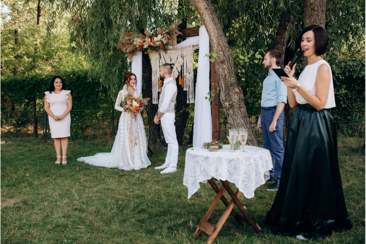 A young couple during their wedding vows