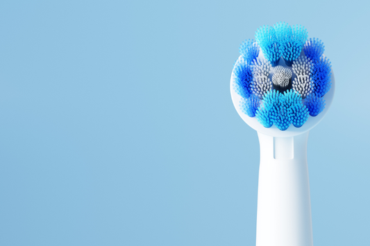 Sonic toothbrush on blue background.