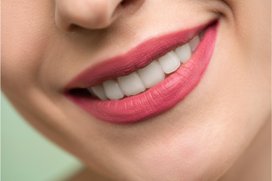 Close-up of a smile with straight, perfectly aligned teeth