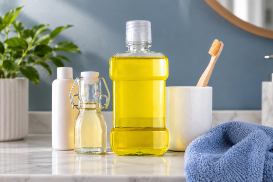 Night guard cleaning solutions and bottles on a bathroom counter