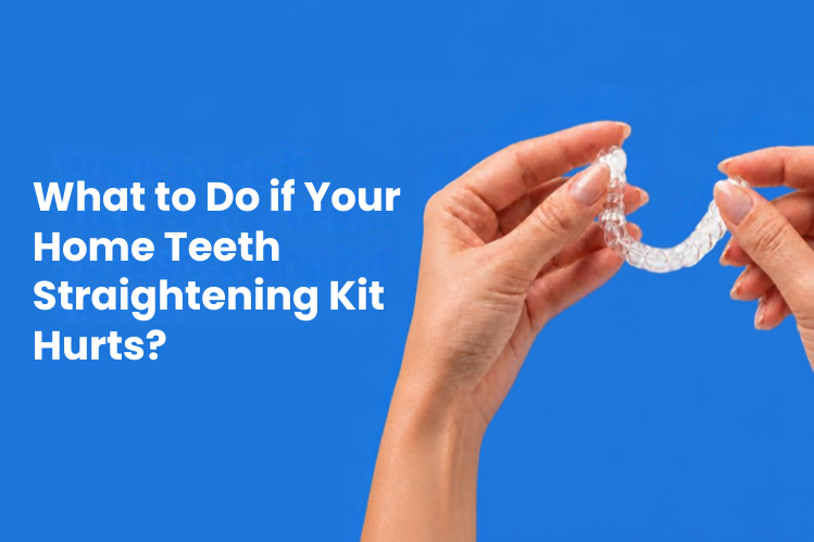 A couple of hands holding a clear aligner in the middle