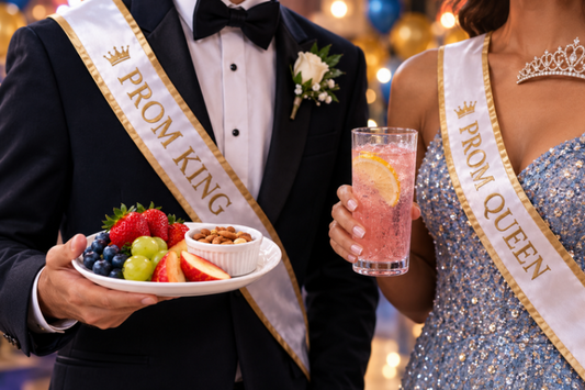 Prom King and Queen holding food items