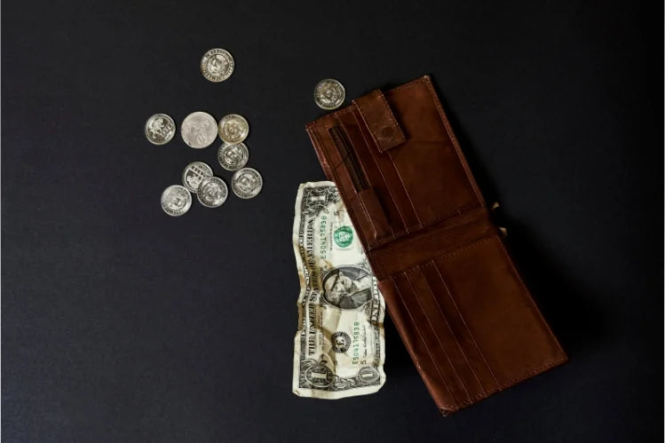 Visual representation of teeth straightening cost using a wallet and money