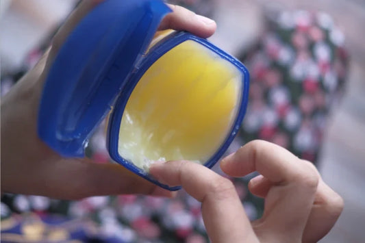 A person using Vaseline